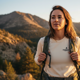 Beige long-sleeve shirt with a logo on a white background